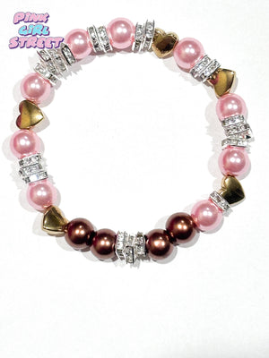 Pandora bracelet with gold hearts Pink pearls and Brown Pearls