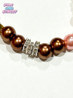 Charm bracelet it’s a Pandora bracelet with Pink And Brown Pearls Bracelet from women’s accessories a beautiful gift bracelet