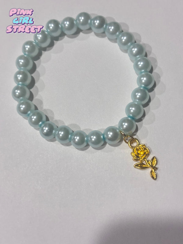 Sky Blue Bracelet With Golden Rose