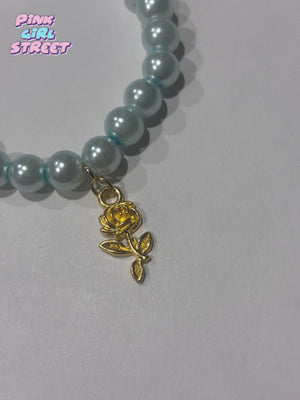 Sky Blue Bracelet With Golden Rose